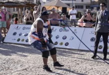 Egyptian wrestler hopes to set new record, pulls ships with his teeth